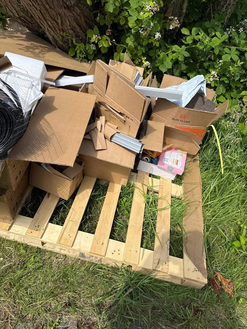 Cardboard and pallet waste collected for recycling in Neath