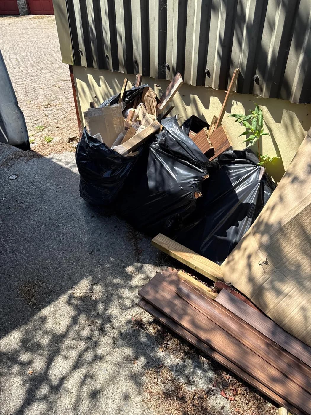 Fly-tipped waste and debris cleared from a site in Neath