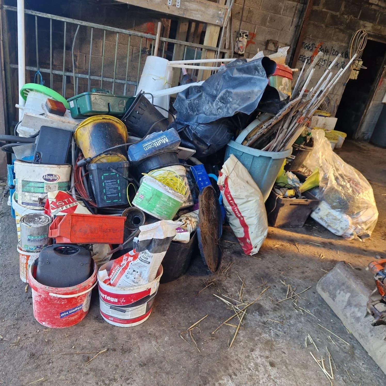 A typical mixed clearance load stacked in an outbuilding