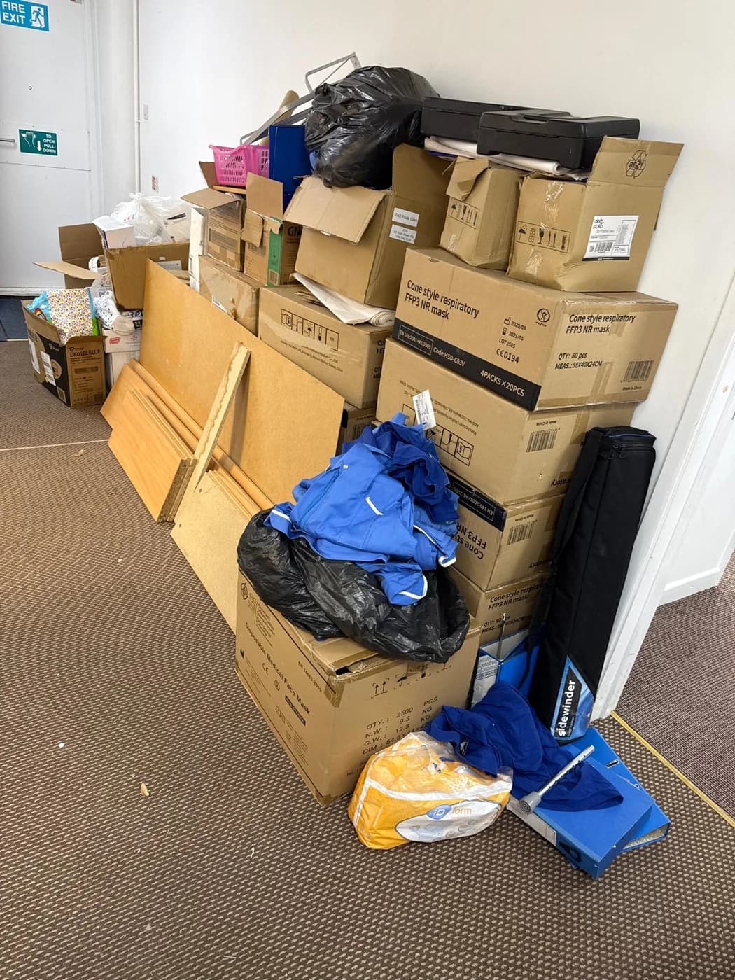 Baled cardboard and office paper ready for recycling in Swansea