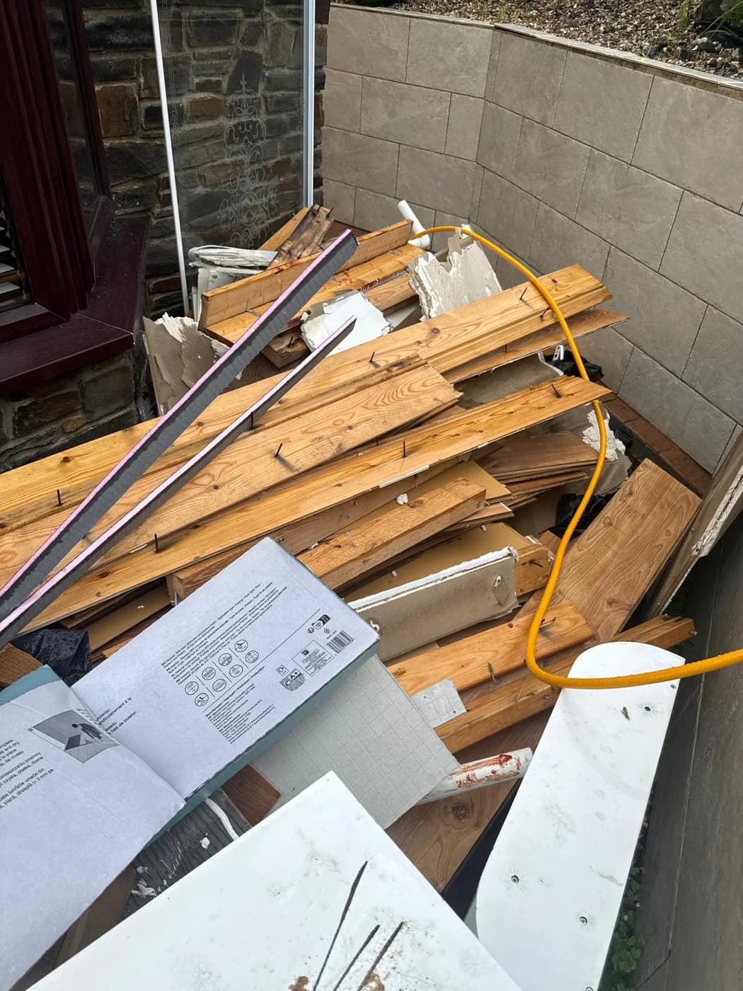 Timber and wood waste loaded for recycling in Neath
